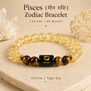 A Pisces Zodiac bracelet made of clear citrine beads and brown tiger eye beads, featuring a central black square bead with a gold Pisces symbol. The bracelet is displayed on a beige stone slab with decorative crystal and dried flower props, with text overlay detailing the zodiac and material information.