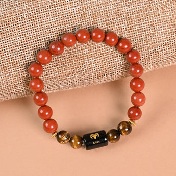 Aries Red Jasper and Tiger's Eye zodiac bracelet styled flat lay