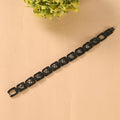 Black Metal Pyrite Bracelet — matte black metal with natural Pyrite beads — World of Oorja