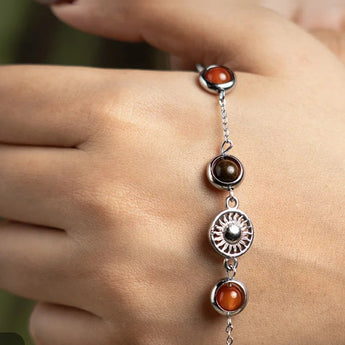 Wearing the Mulank 1 Sun charm bracelet on the wrist
