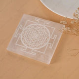 Natural selenite charging plate with engraved Shree Yantra – cleanse and charge your crystals – World of Oorja