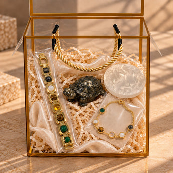 Dhan Yog Couple Gift Box with men's and women's Dhan Yog bracelets, pyrite tortoise and selenite plate