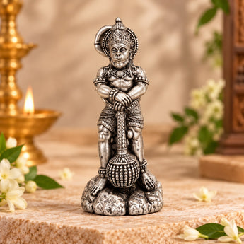 Silver plated Hanuman idol resting on gada