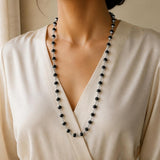 Silver Plated Karungali Mala worn by a woman