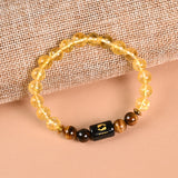 Pisces Citrine and Tiger's Eye zodiac bracelet flat lay