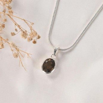 Smoky Quartz pendant in the Classic setting shown on its free silver-tone chain – World of Oorja crystal jewellery