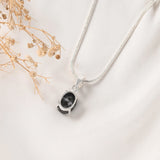 Sulemani Hakik pendant Prong setting back view on silver snake chain