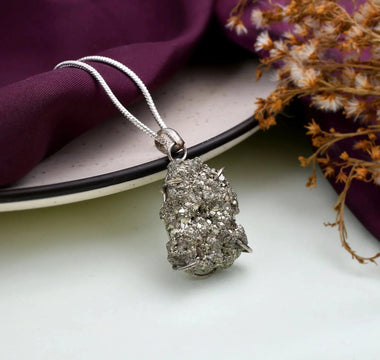 Incredible Benefits of Raw Pyrite Pendants - WorldOfOorja