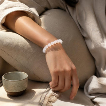 Milky Quartz bracelet worn on the wrist for calm and emotional balance - World of Oorja