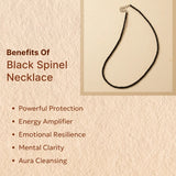 Black spinel necklace with benefits listed on a beige background