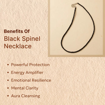 Black spinel necklace with benefits listed on a beige background