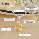 Silver pendant with a yellow gemstone on a beige surface with text highlighting its benefits.