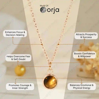 Gold necklace with pendant on a white background, featuring Orja brand.