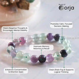 Multicolored beaded bracelet with health benefits text on a blurred background