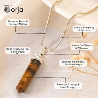 Crystal necklace with labeled benefits on a neutral background