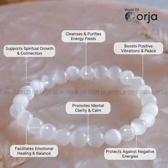 White beaded bracelet with text highlighting its benefits, branded 'World of Orja'.