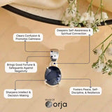 Orja pendant on a beige background with text about its benefits