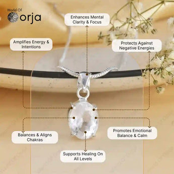 Silver pendant on a necklace with Orja branding, featuring benefits text on a blurred floral background.