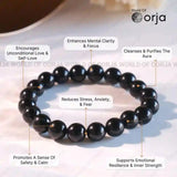 Black beaded bracelet with text highlighting its benefits on a light background
