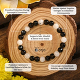 Yatra Suraksha Bracelet beaded with crystal beads and descriptive text on a wooden background