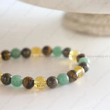 Beaded bracelet with multicolored beads on a light background