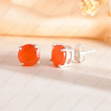 Handcrafted carnelian studs set in sterling silver