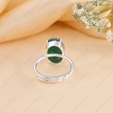 Polished green aventurine ring set in silver band