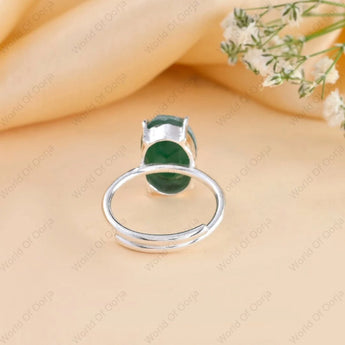 Polished green aventurine ring set in silver band
