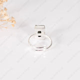 Pyrite stone ring on a white background