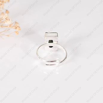 Pyrite stone ring on a white background