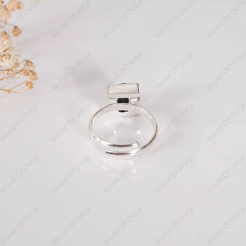 Pyrite silver ring on a white background