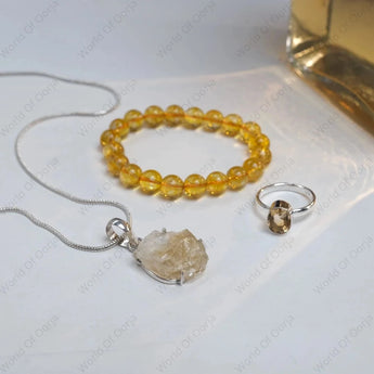 Crystal Jewelry set with necklace, bracelet, and ring on a white surface