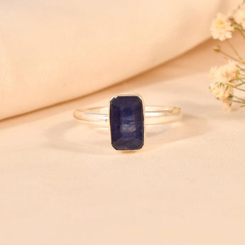 Blue sapphire ring with a polished finish, set in high-quality 925 sterling silver