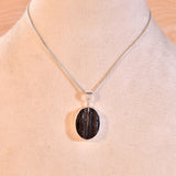 Organic raw Black Tourmaline gemstone pendant for negative energy protection