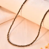 Pyrite diamond cut necklace on a light background