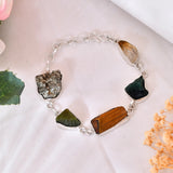 Raw Dhan Yog Bracelet made with natural Pyrite, Citrine, Tiger Eye, Green Aventurine, and Jade crystals for wealth, prosperity, and abundance attraction. Energized crystal bracelet for money luck and success.