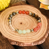 Multicolored beaded bracelet on a wooden surface
