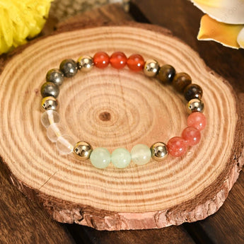 Multicolored beaded bracelet on a wooden surface