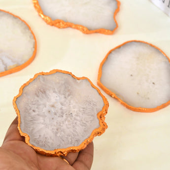 Close-up of a natural crystal agate coaster showing unique banded patterns and polished surface