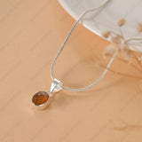 Elegant Yellow Sapphire (Pukhraj) pendant with waterproof, rust-proof chain