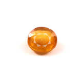 yellow sapphire (pukhraj) 4.06 carat stone on white background 