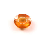 yellow sapphire (pukhraj) 8.92 carat stone on white background 