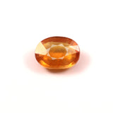 yellow sapphire (pukhraj) 5.10 carat stone on white background 