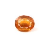yellow sapphire (pukhraj) 7.34 carat stone on white background 