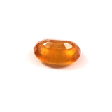 yellow sapphire (pukhraj) 7.34 carat stone on white background 