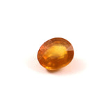 yellow sapphire (pukhraj) 7.38 carat stone on white background 
