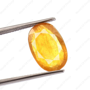 Authentic 8.08 Carat Pukhraj) Yellow Sapphire (8.86 Ratti) with lab certificate