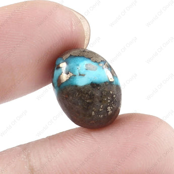 Authentic Firoza Turquoise, 9.60 carats (10.46 ratti), oval cabochon shape, vivid blue,