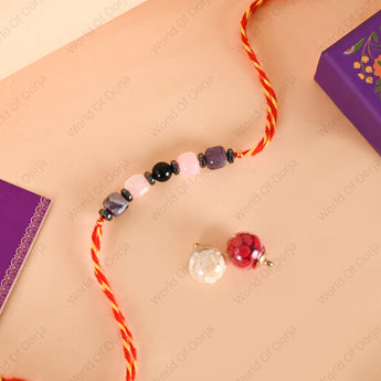 Sacred thread for emotional balance with Rose Quartz for love, Amethyst for peace, and Obsidian for protection