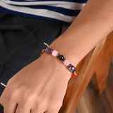 Elegant thread featuring Rose Quartz, Amethyst, and Obsidian for heart-centered connection